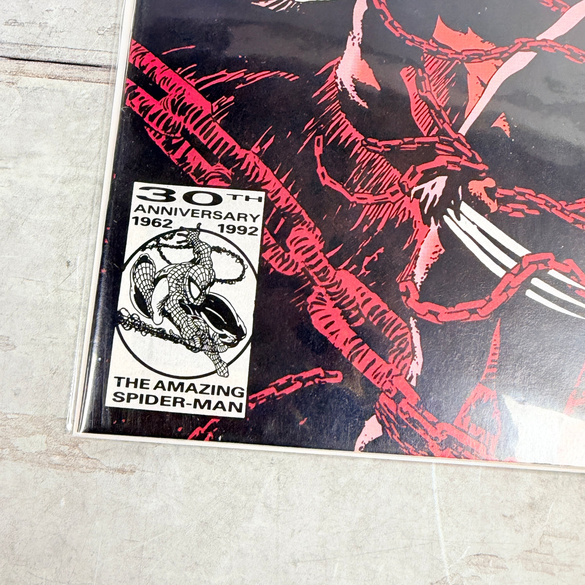Marvel Comics Presents #110 (1992), Steve Lightle Wolverine and Typhoid Mary cover, direct-sale emblem: lower-left anniversary emblem detail of the actual pre-owned copy.