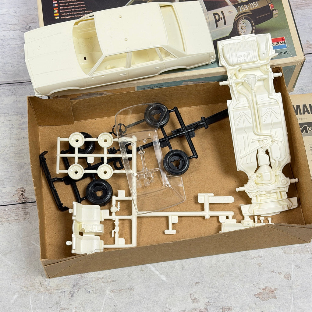 Close-up of Malibu model body chassis wheels and sprues