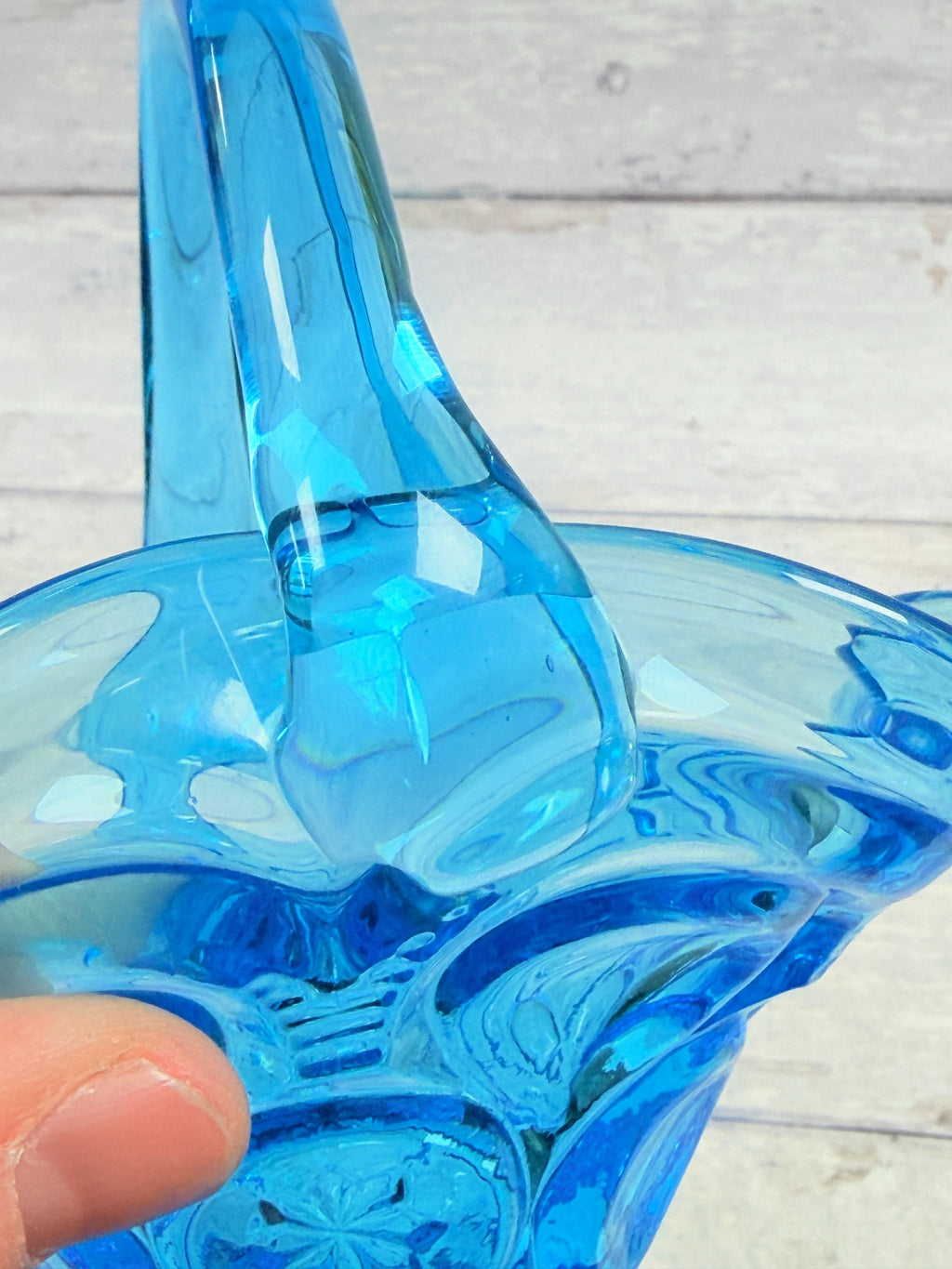 Opposite handle attachment on blue pressed glass basket