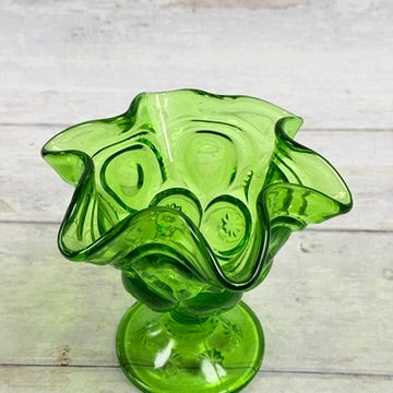 Overhead view of green Moon and Star glass compote