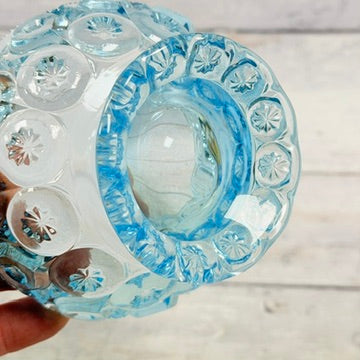 Underside of footed Moon and Star candy dish