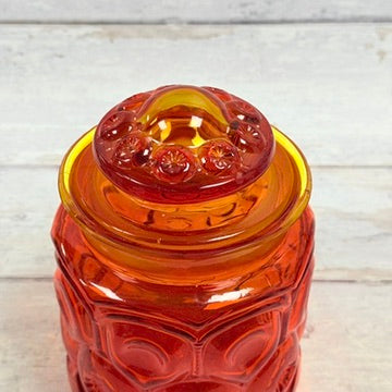 Domed amberina glass lid close up