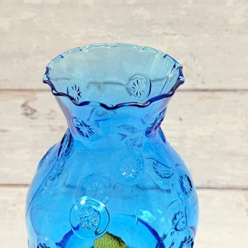Scalloped blue glass chimney of Moon and Star oil lamp