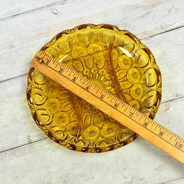 Ruler showing approximate diameter of amber Moon and Star divided relish dish