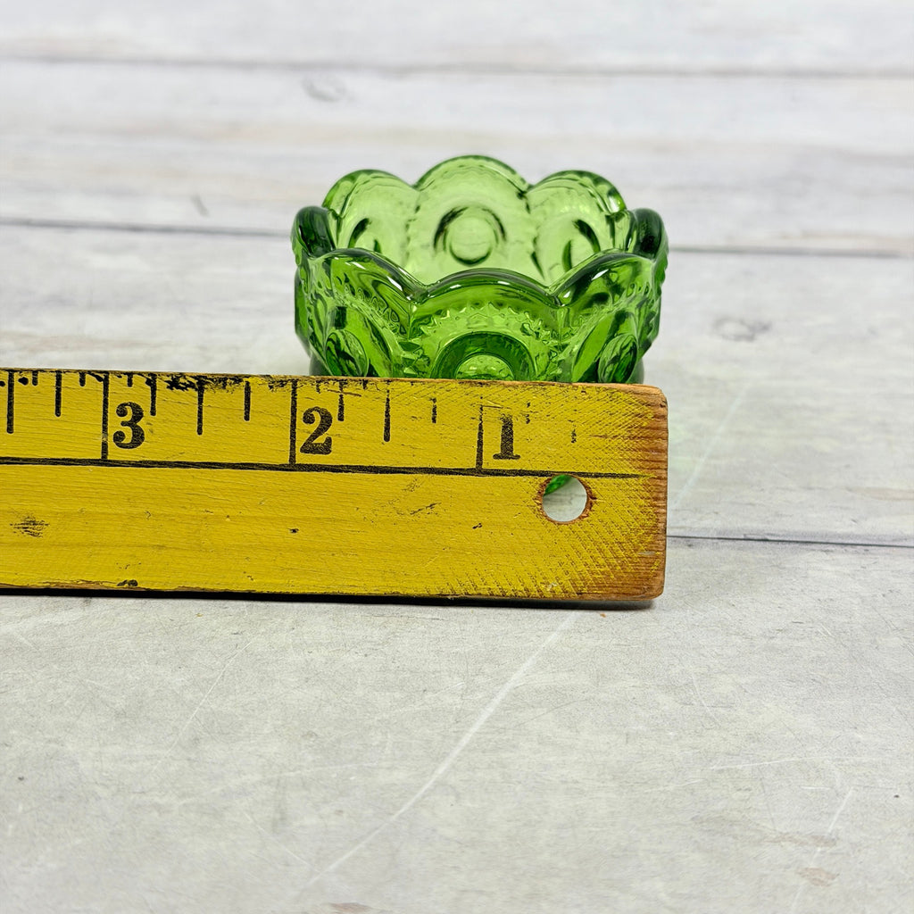 Green Moon and Star open salt beside ruler showing approximate two-inch width