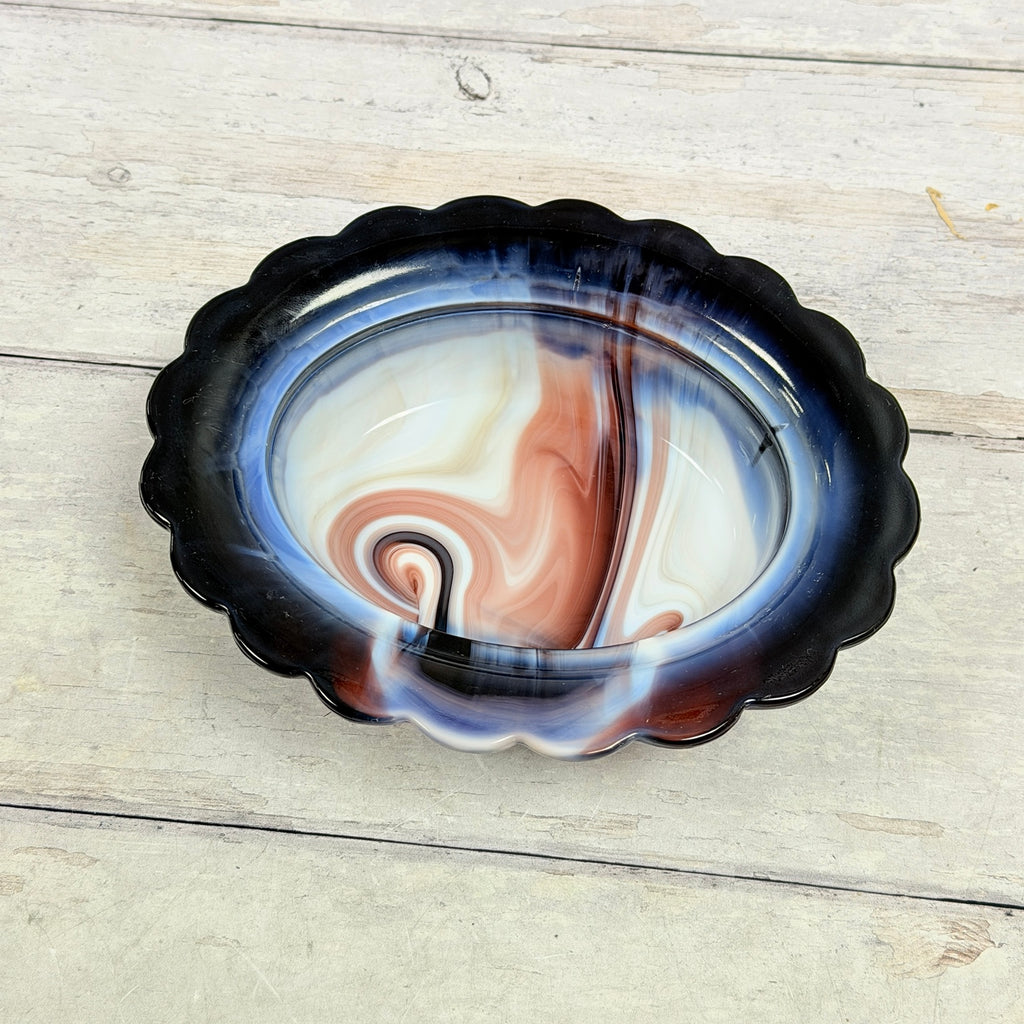 Interior of Mosser Glass amethyst and white slag hen-on-nest dish