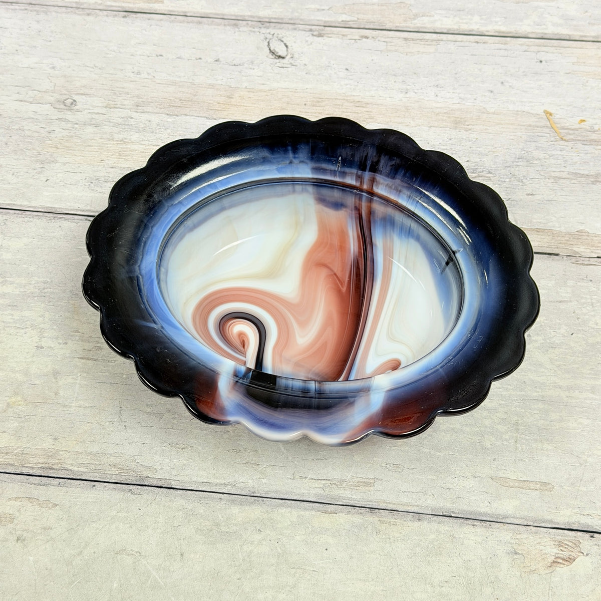 Interior of Mosser Glass amethyst and white slag hen-on-nest dish