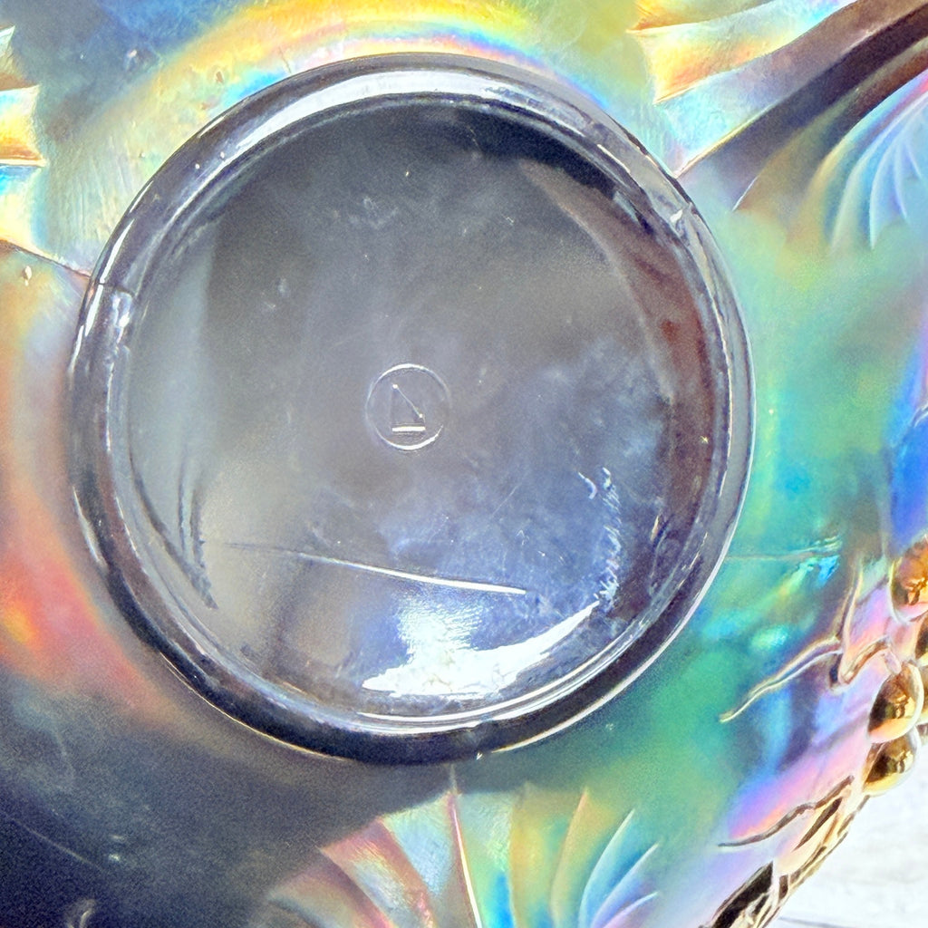 Close-up of underlined Northwood N-in-circle mark and underside scratches