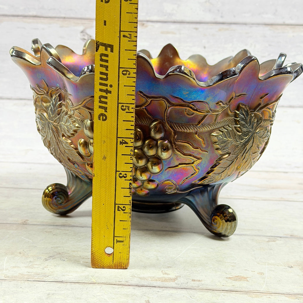 Northwood carnival glass fruit bowl beside ruler for approximate height