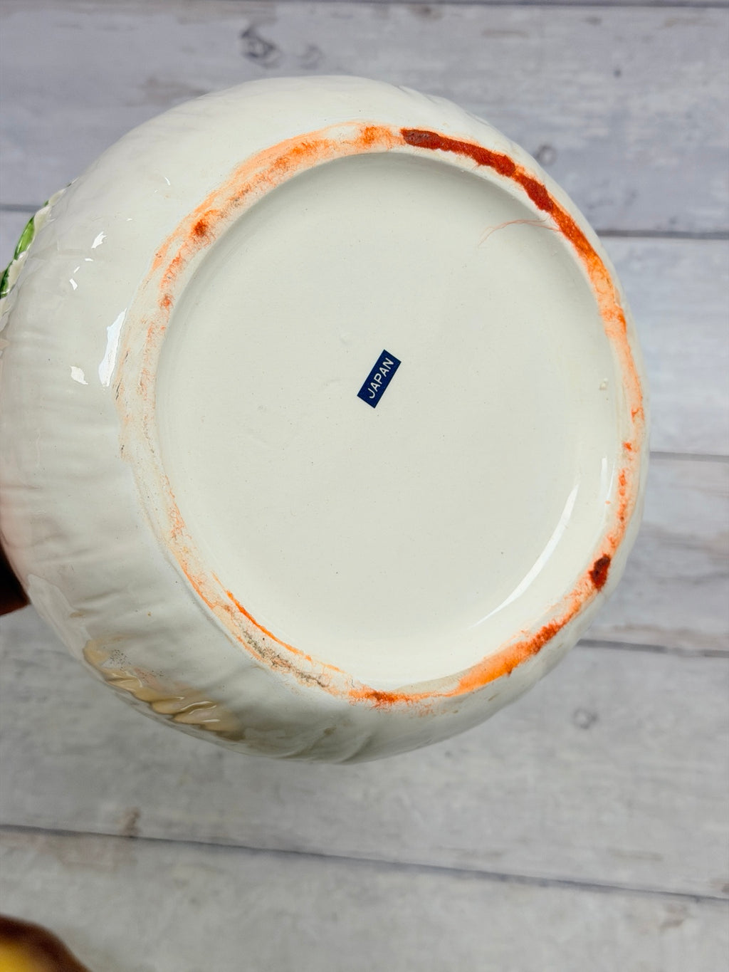 Interior of cream ceramic mushroom canister