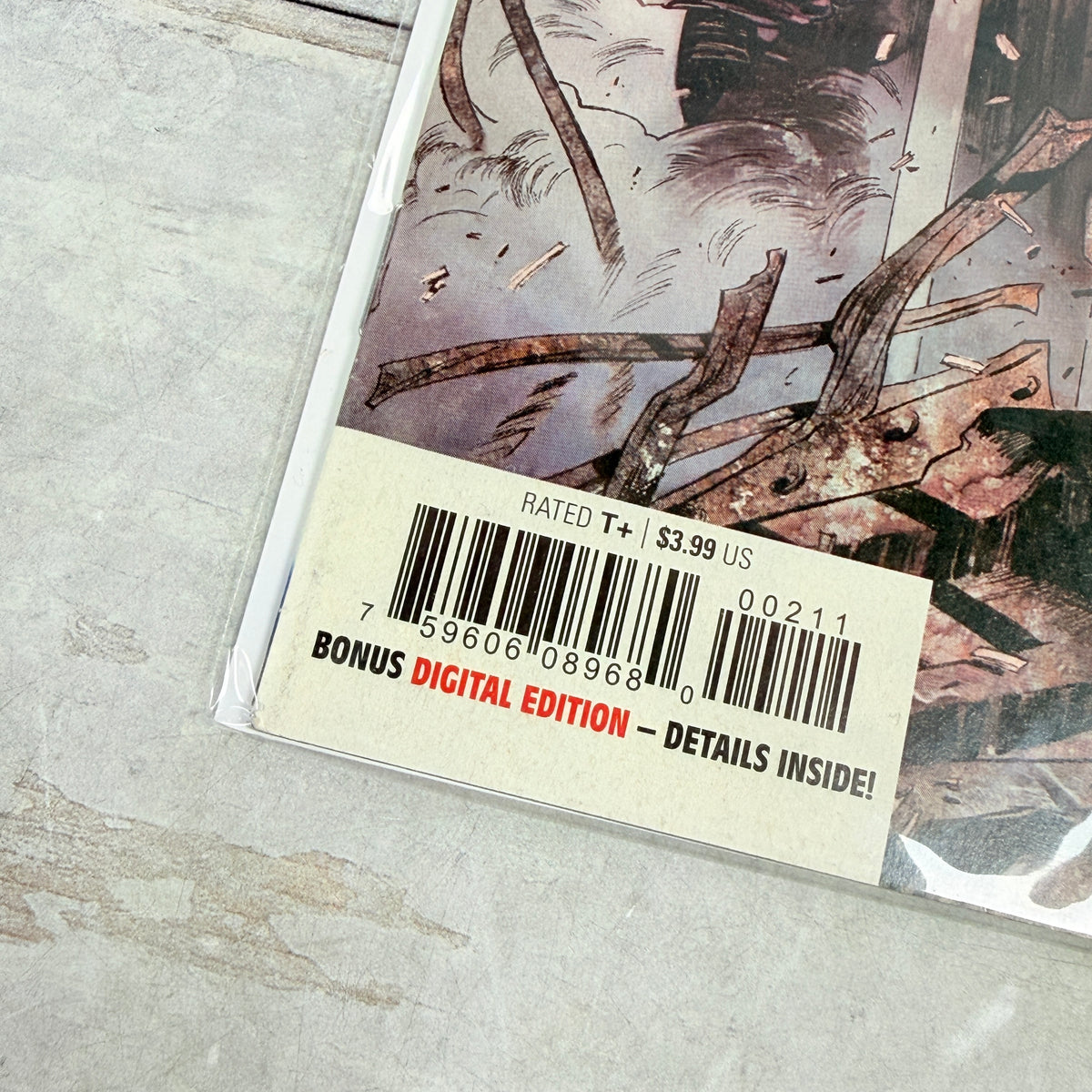 Tony Stark: Iron Man #2 (2018), Alexander Lozano regular cover: lower-left front detail of the actual pre-owned copy.