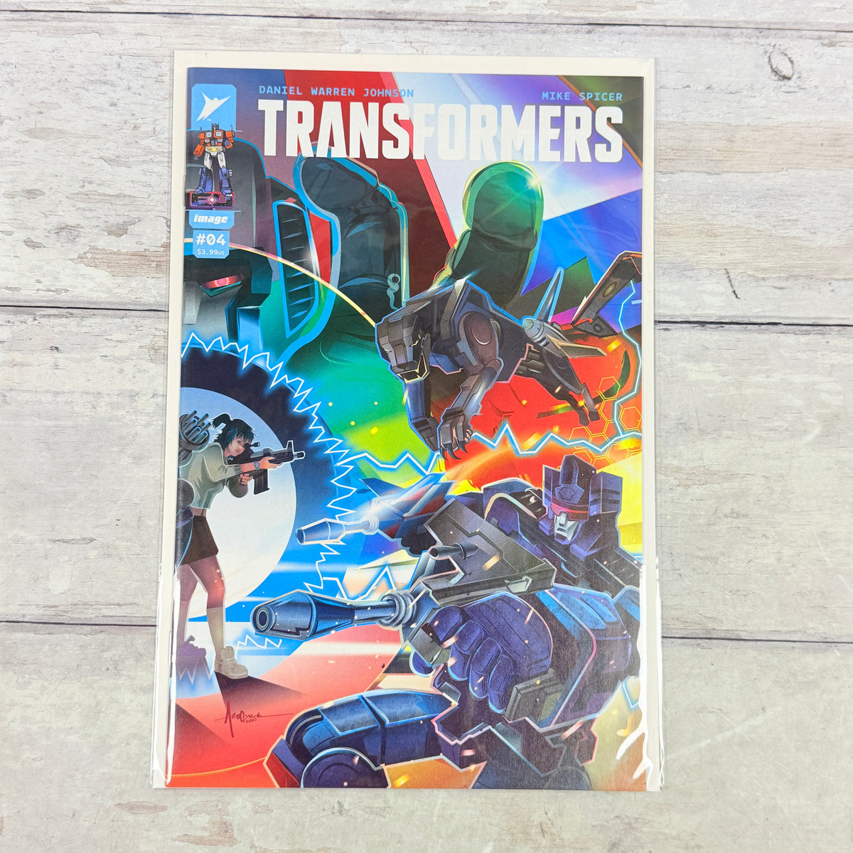Transformers #4 (2024) Orlando Arocena Cover C: full front cover of the actual pre-owned copy.