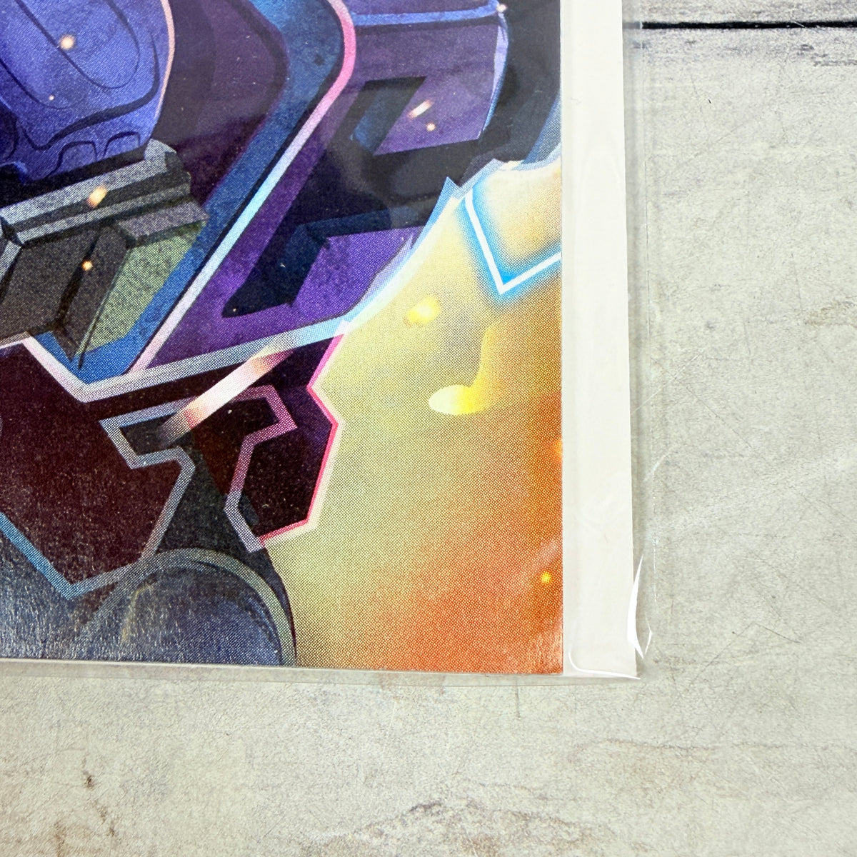 Transformers #4 (2024) Orlando Arocena Cover C: lower-right front corner detail of the actual pre-owned copy.