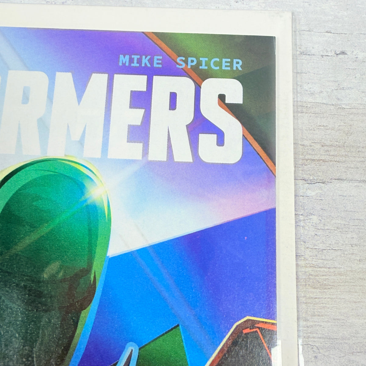 Transformers #4 (2024) Orlando Arocena Cover C: upper-right front corner and title detail of the actual pre-owned copy.