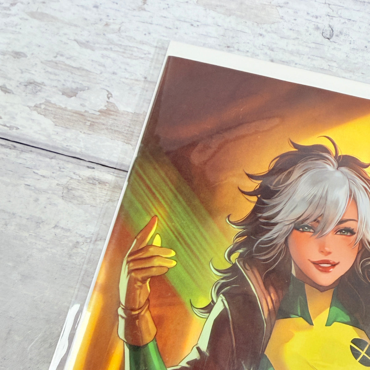Uncanny X-Men #8 (2025) Leirix Rogue Virgin Variant, upper-left detail in clear sleeve