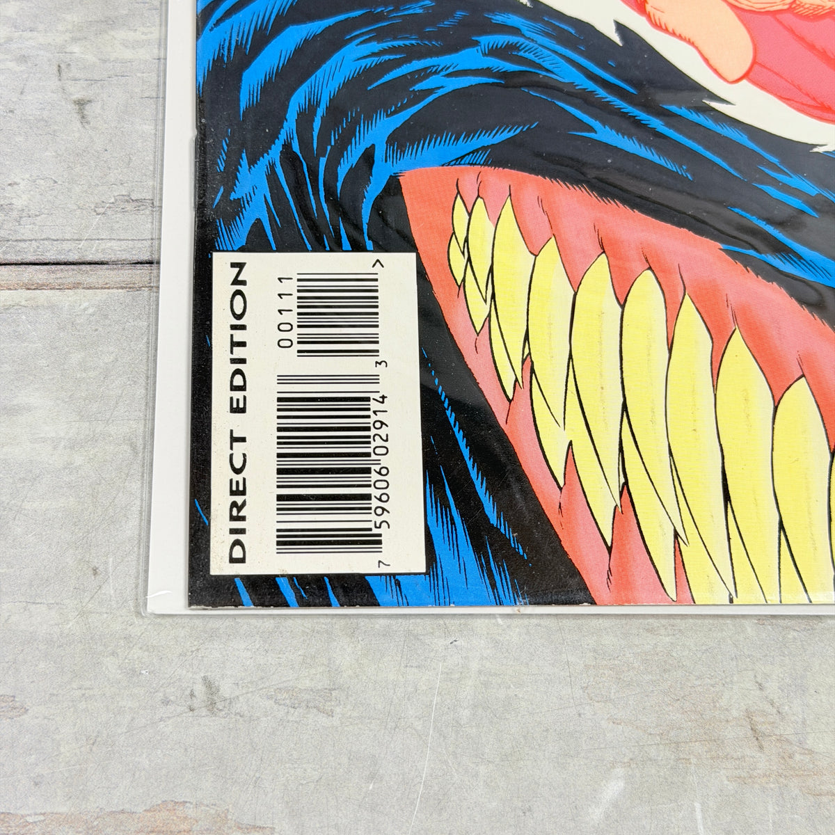 Venom: The Madness #1, lower-left front detail