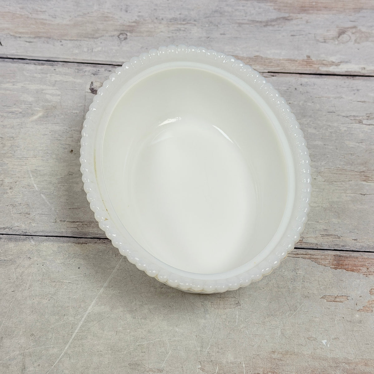 Interior of the white glass nest dish