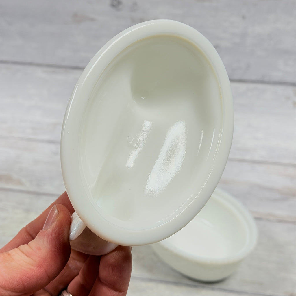 Underside of the removable hen lid