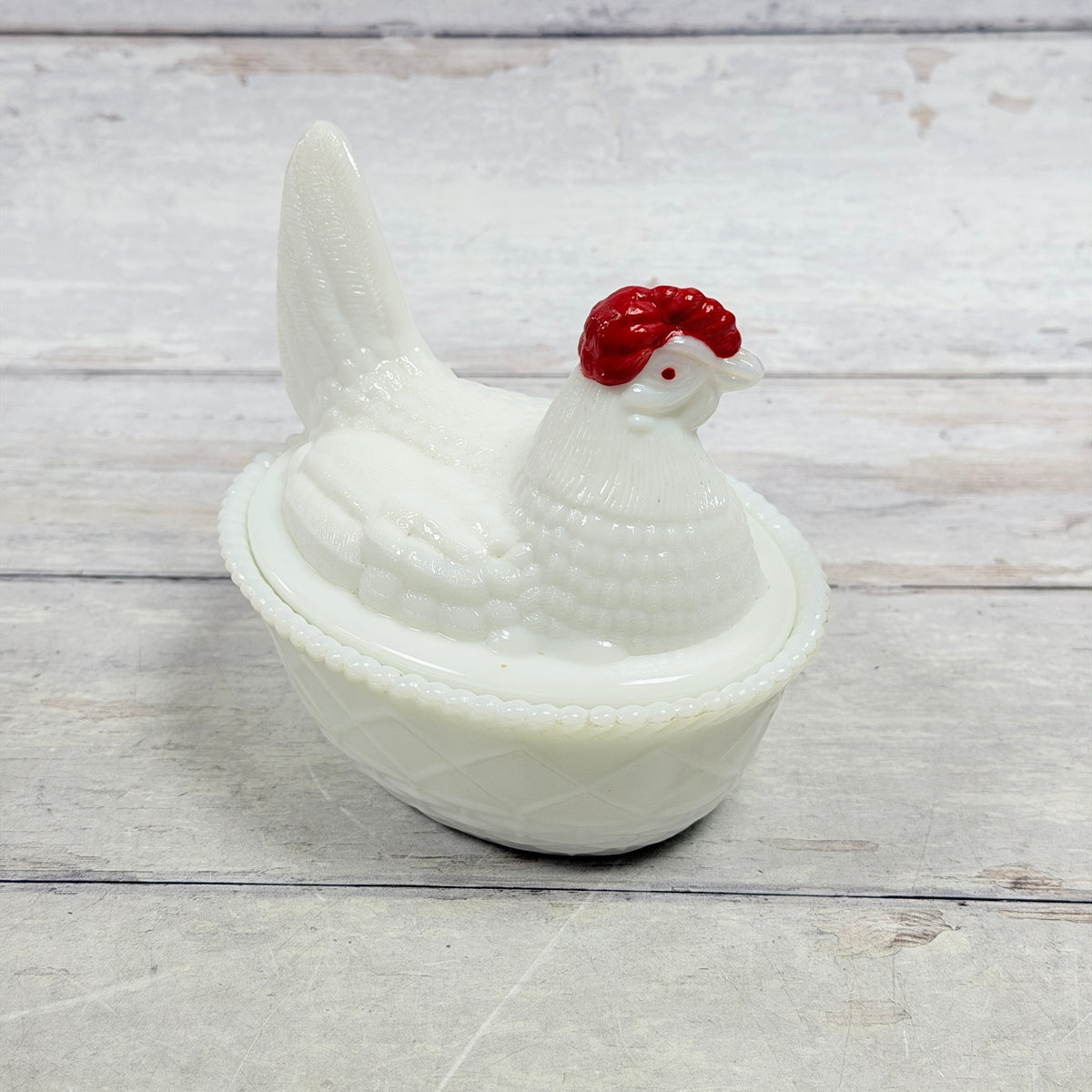 White milk glass Westmoreland hen on nest with red comb, alternate view