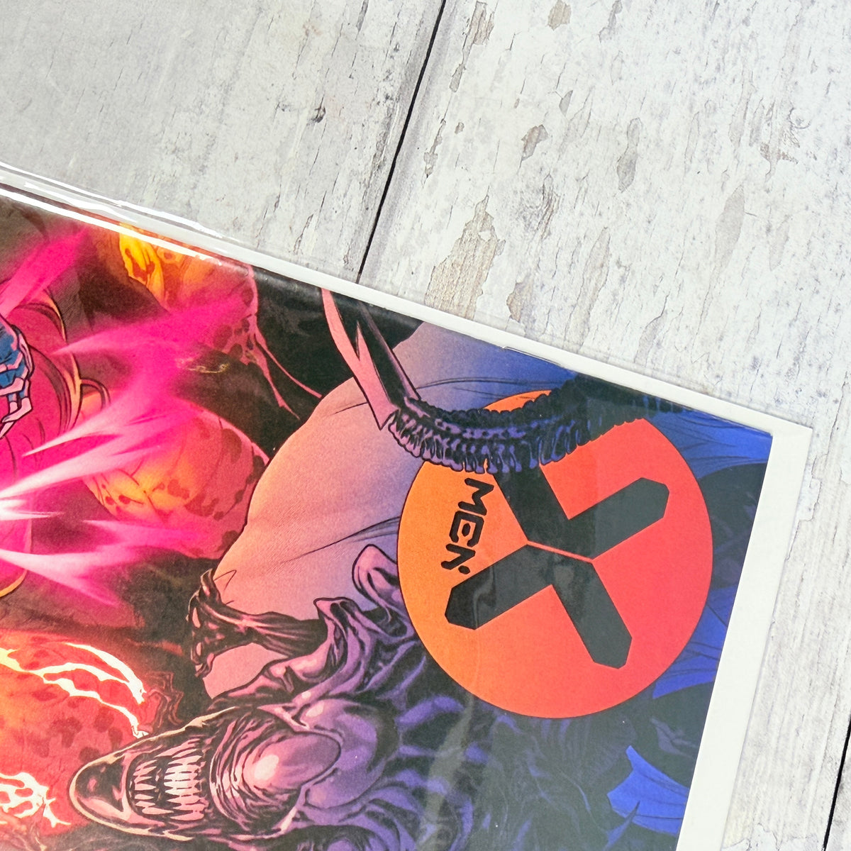 X-Men #17 (2021), Russell Dauterman Marvel vs. Alien variant: upper-left front detail of the actual pre-owned copy.