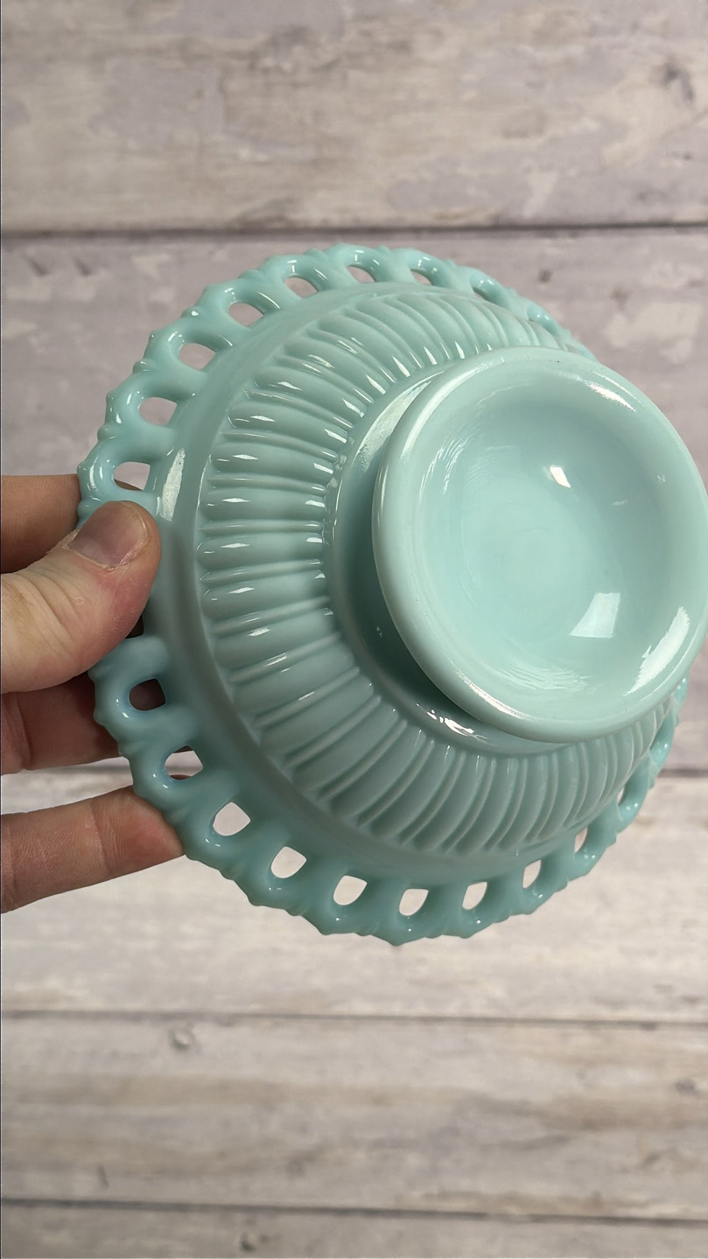 Fostoria Randolph aqua blue milk glass candy dish, close view of pedestal underside showing light base wear.