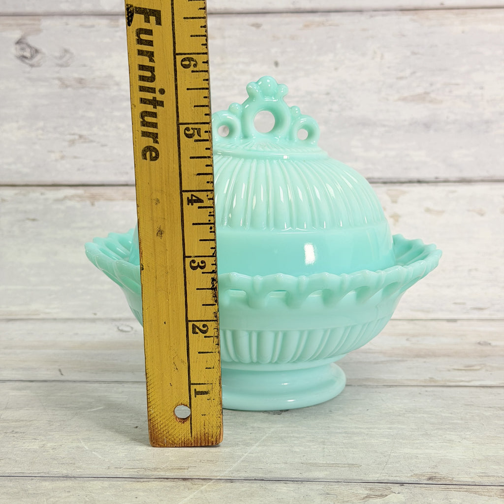 Fostoria Randolph aqua blue milk glass candy dish, ruler beside covered dish showing approximate overall height.