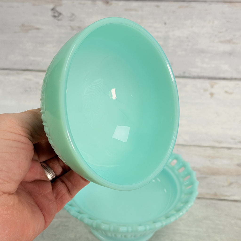 Underside of the Fostoria Randolph aqua blue milk glass lid showing its smooth interior and seating rim.