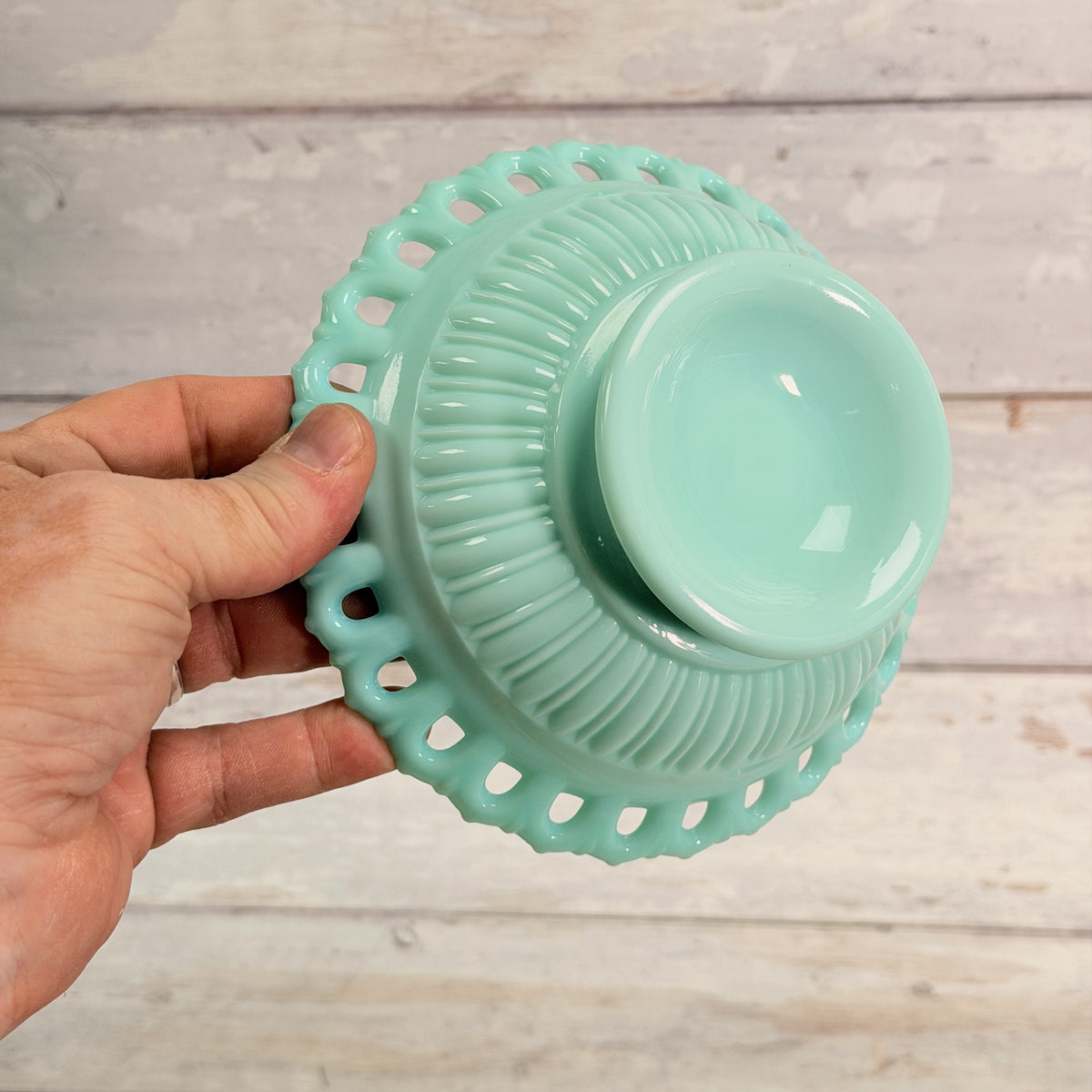 Fostoria Randolph aqua blue milk glass candy dish, underside showing pedestal foot and molded ribbing.