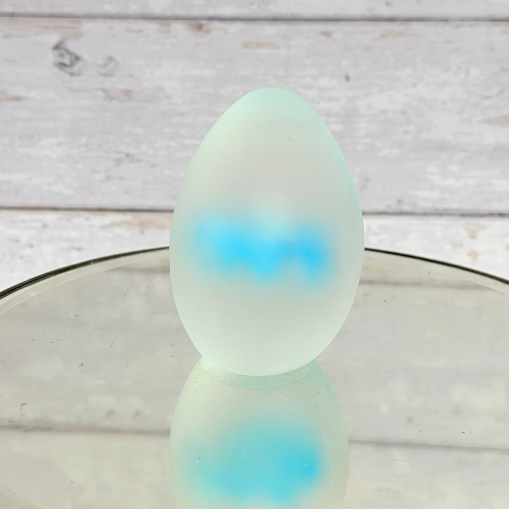 Frosted reverse of blue flower glass paperweight