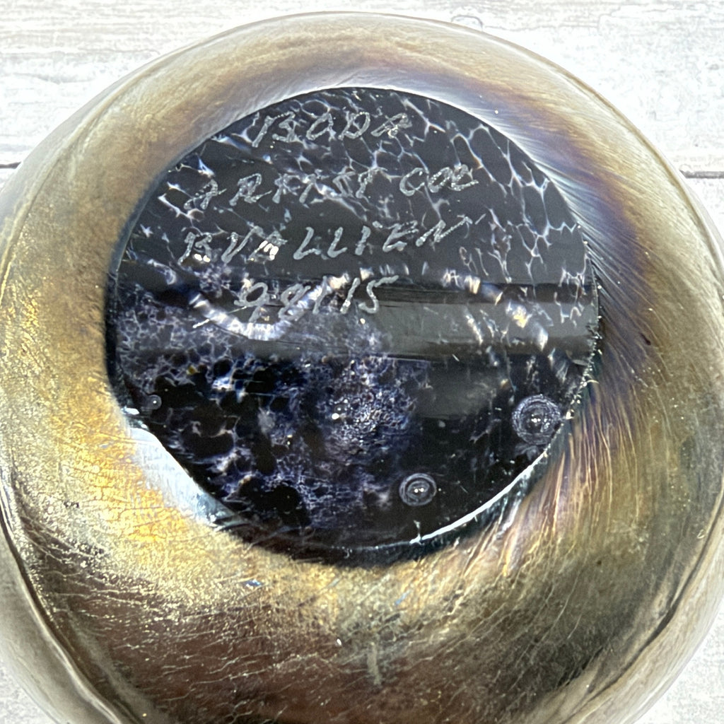 Underside of Boda Artist Collection paperweight showing etched signature and number