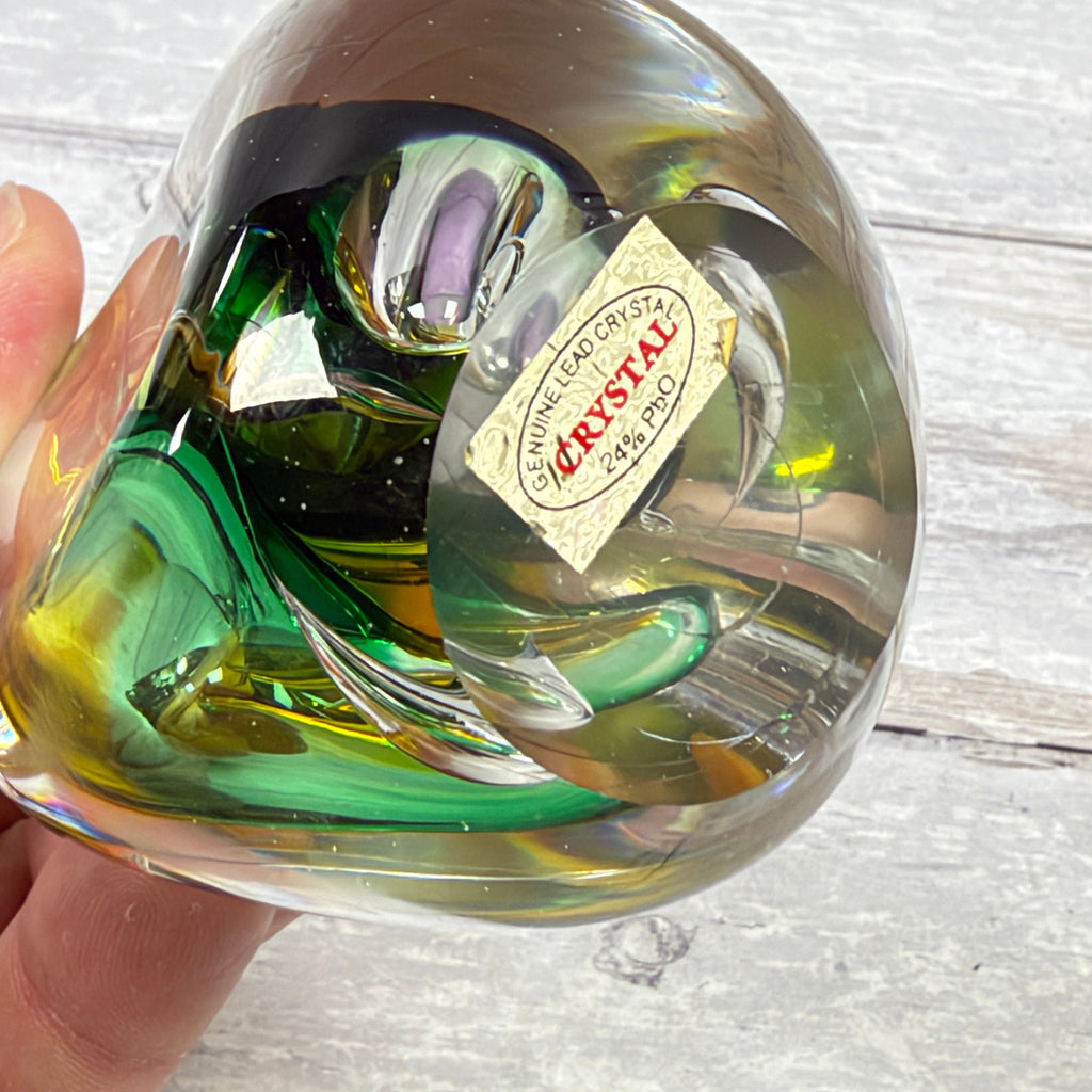Underside of teardrop paperweight showing Genuine Lead Crystal 24% PbO label and surface scratches