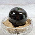 Dark Green Glass Apple Paperweight, view 1; display props not included