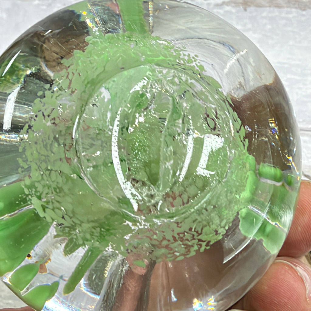 Lime Green Floral Controlled-Bubble Glass Paperweight, close-up of surface or underside; display props not included