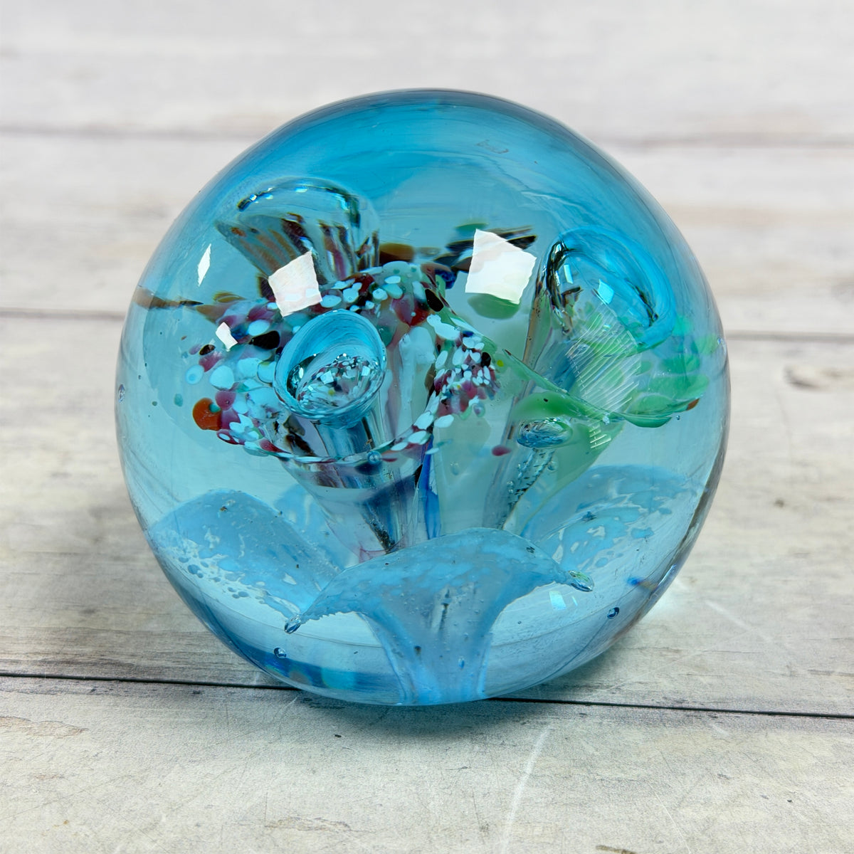 Aqua Blue Controlled-Bubble Glass Paperweight with Multicolor Frit - product view