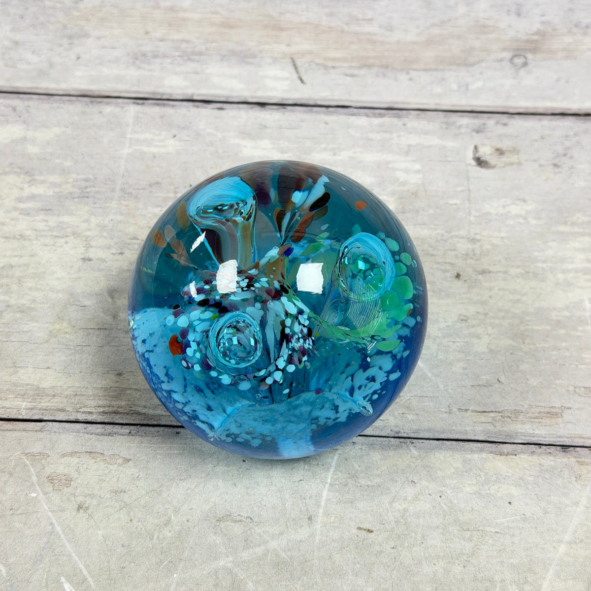 Aqua Blue Controlled-Bubble Glass Paperweight with Multicolor Frit - product view